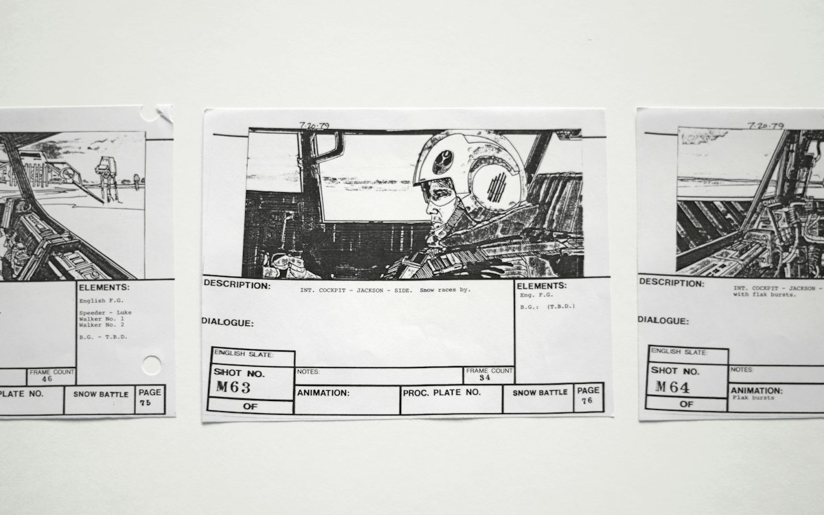 Film storyboard panels pinned to a wall